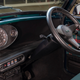 Image for article titled This Gauge Alone Makes The Classic Mini EV An Instant Winner